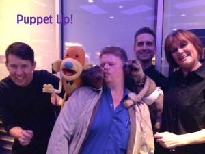 (L-to-R) Brian Clark, Grant Baciocco and Peggy Etra surround me with puppet love